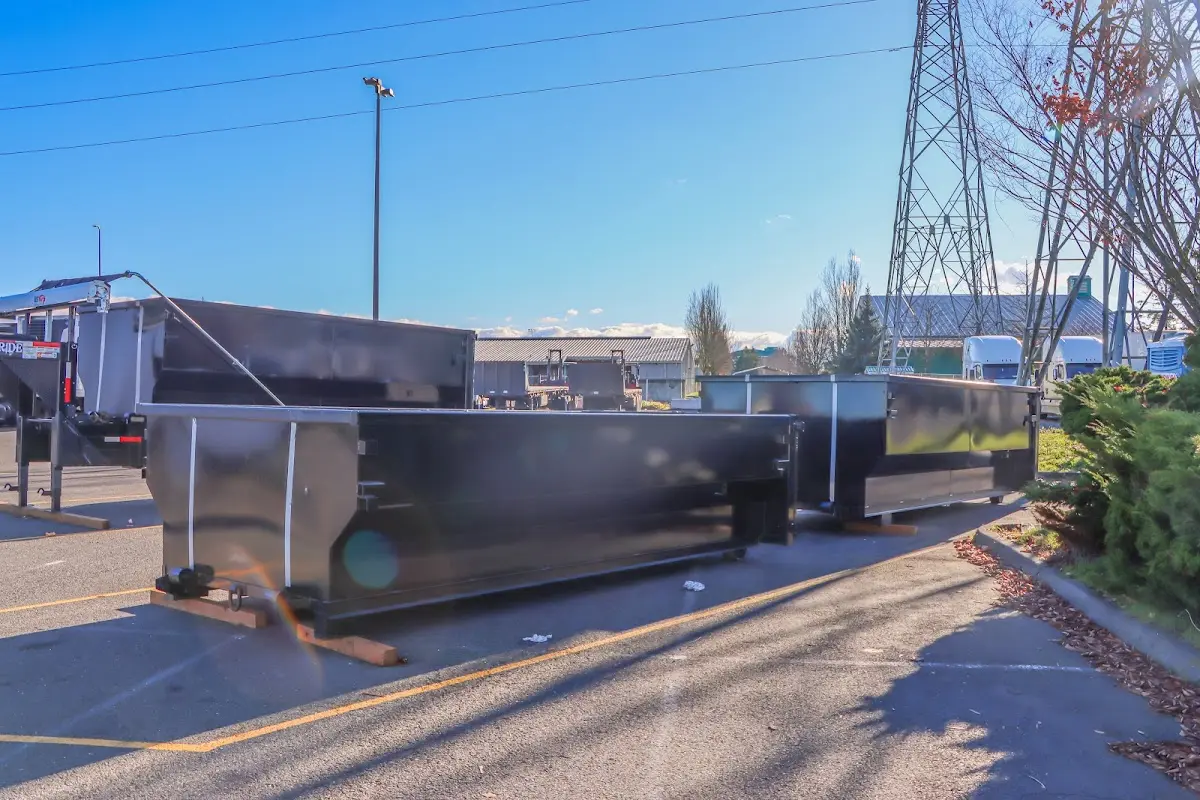 Roll-off dumpster ready for waste disposal at job site for Construction Dumpster Rental in North Hills